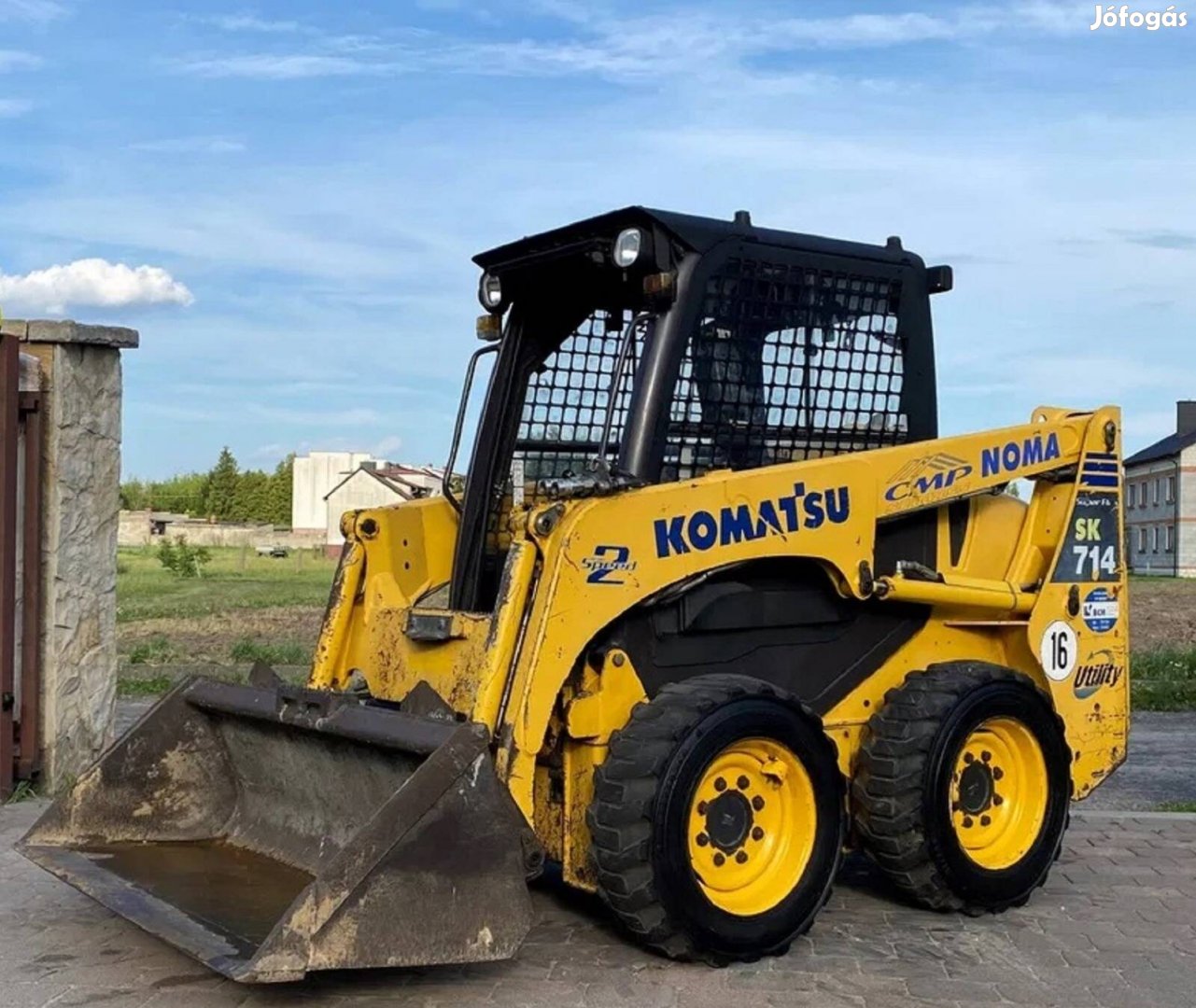 Komatsu sk714 csúszókerekes homlokrakodó 