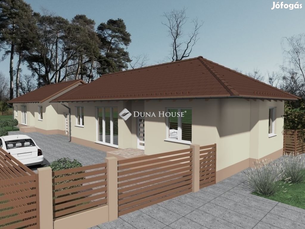 Központban újépítésű ikerházfél, hőszivattyús fűtéssel