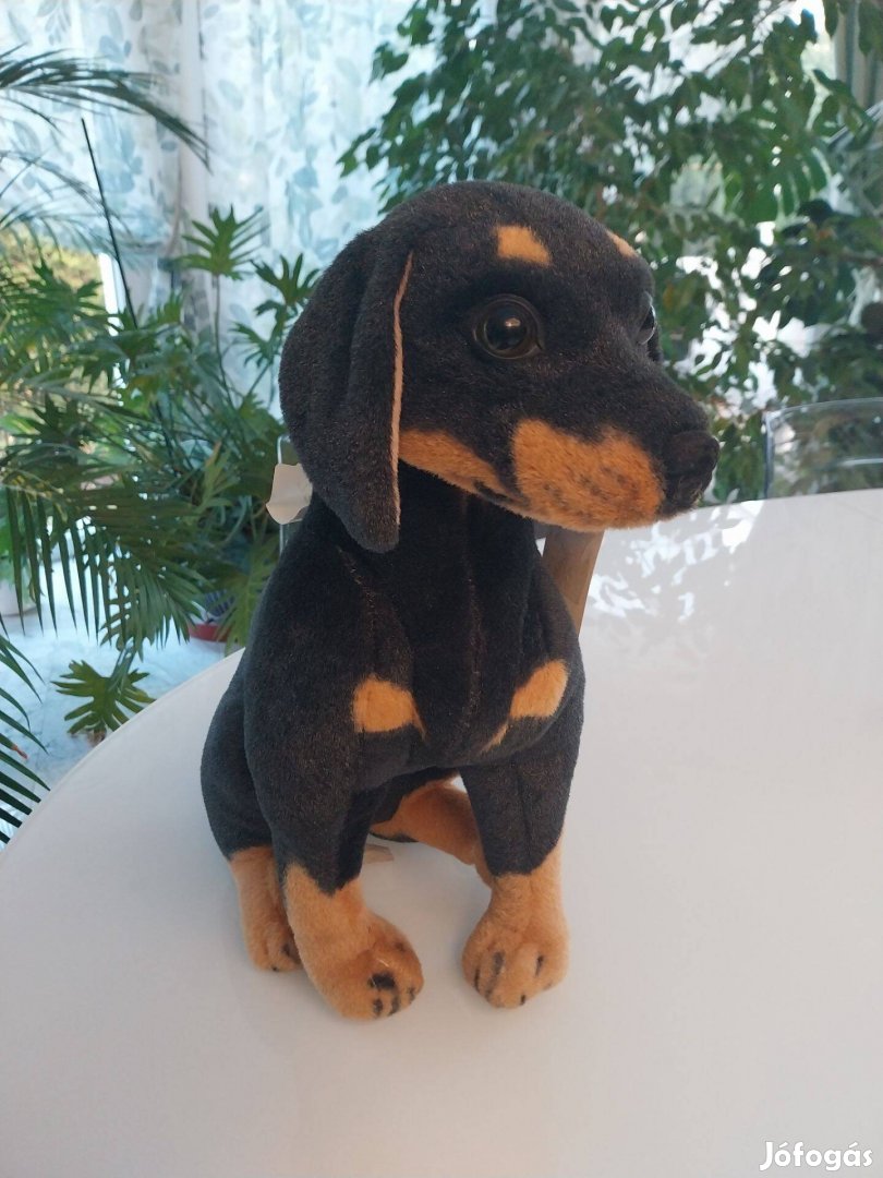 Kutya plüss, ülő rottweiler