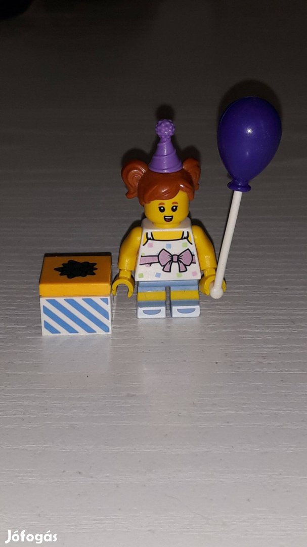 Lego figura - Kislány bohóc jelmezben lufival ajándékdobozzal