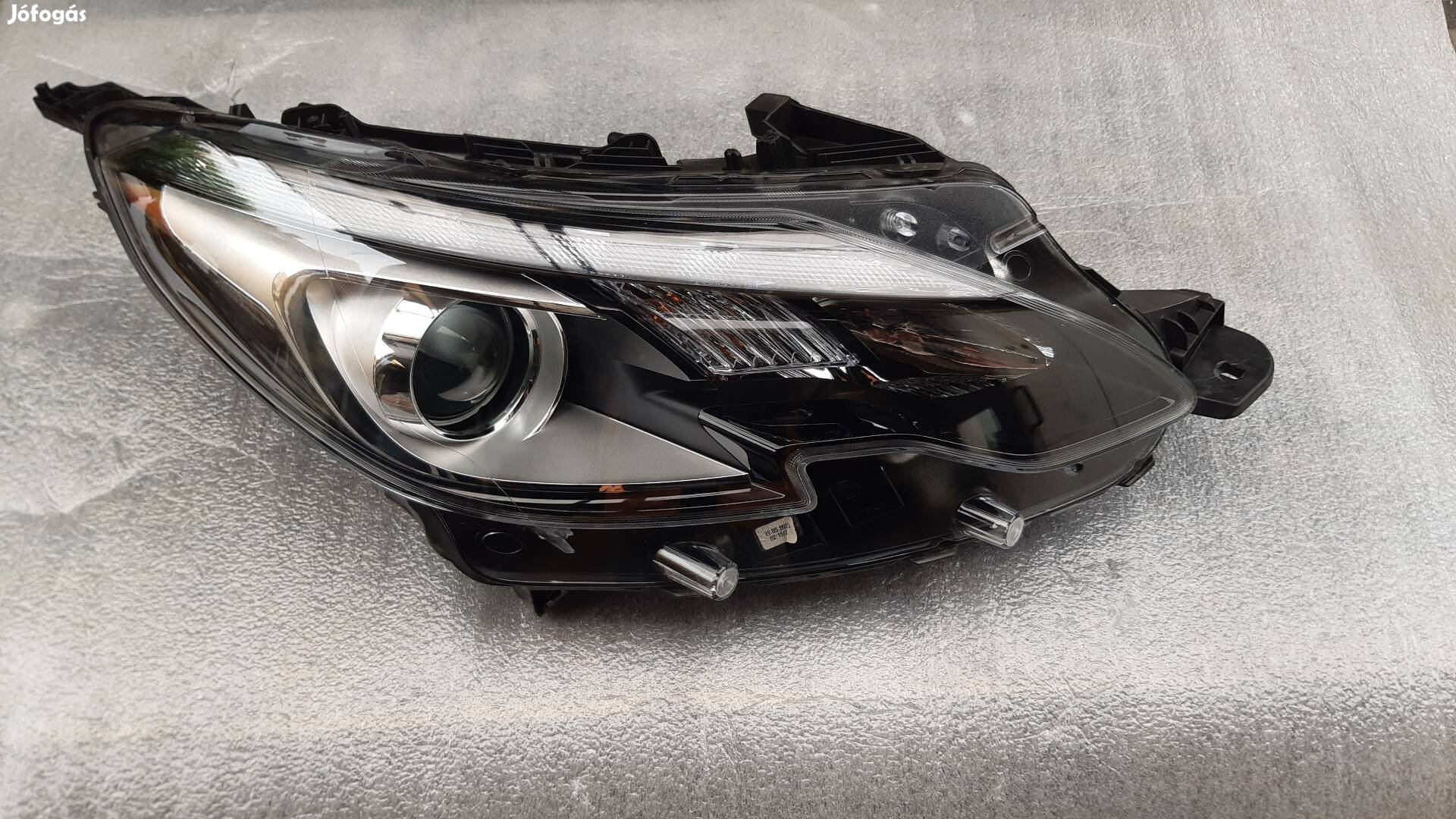 Ligier JS60 első fényszóró 