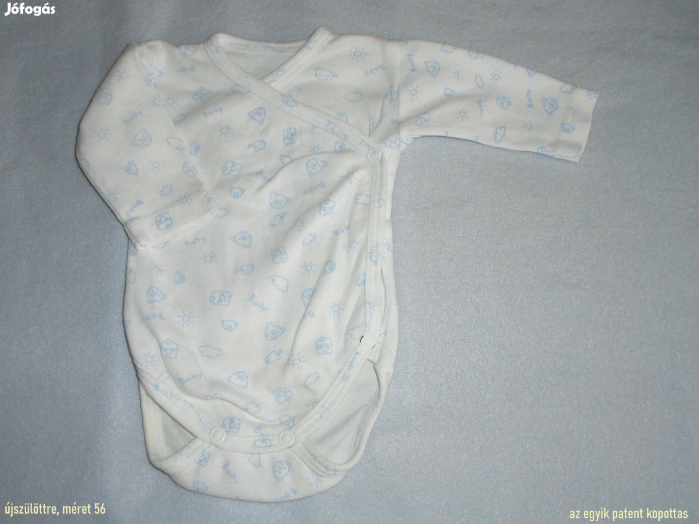 Maci mintás fehér színű hosszú ujjú body újszülöttre méret