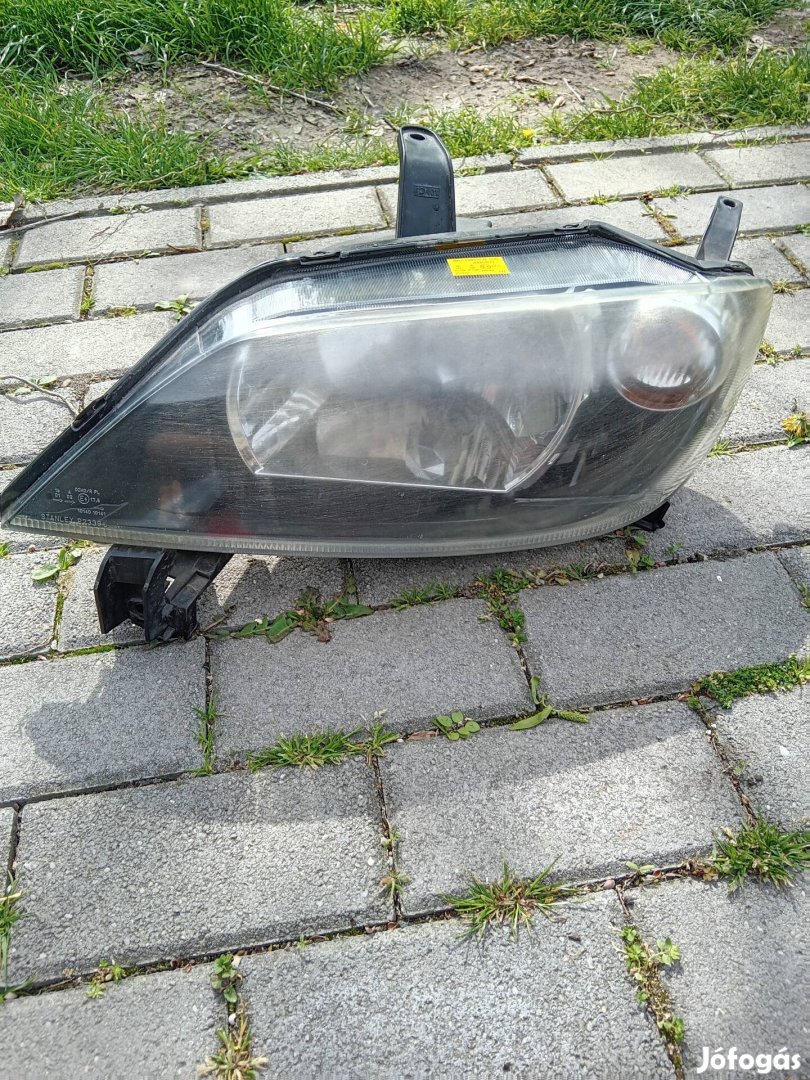 Mazda 2 bal első lámpa 