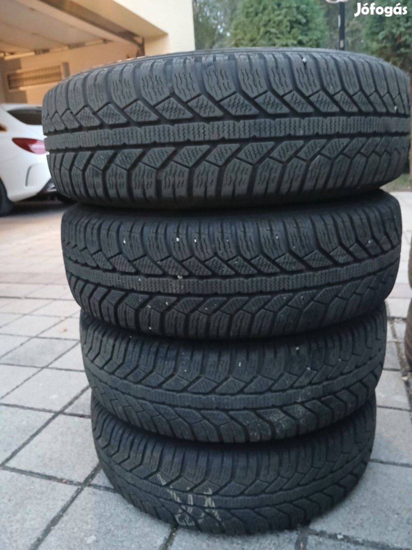 Mazda 2 gyári felni téli gumival 175/65R14 gyári dísztárcsával