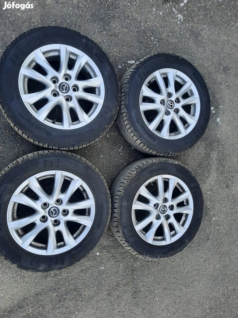 Mazda 3 gyári alufelni 90% nyári gumikkal