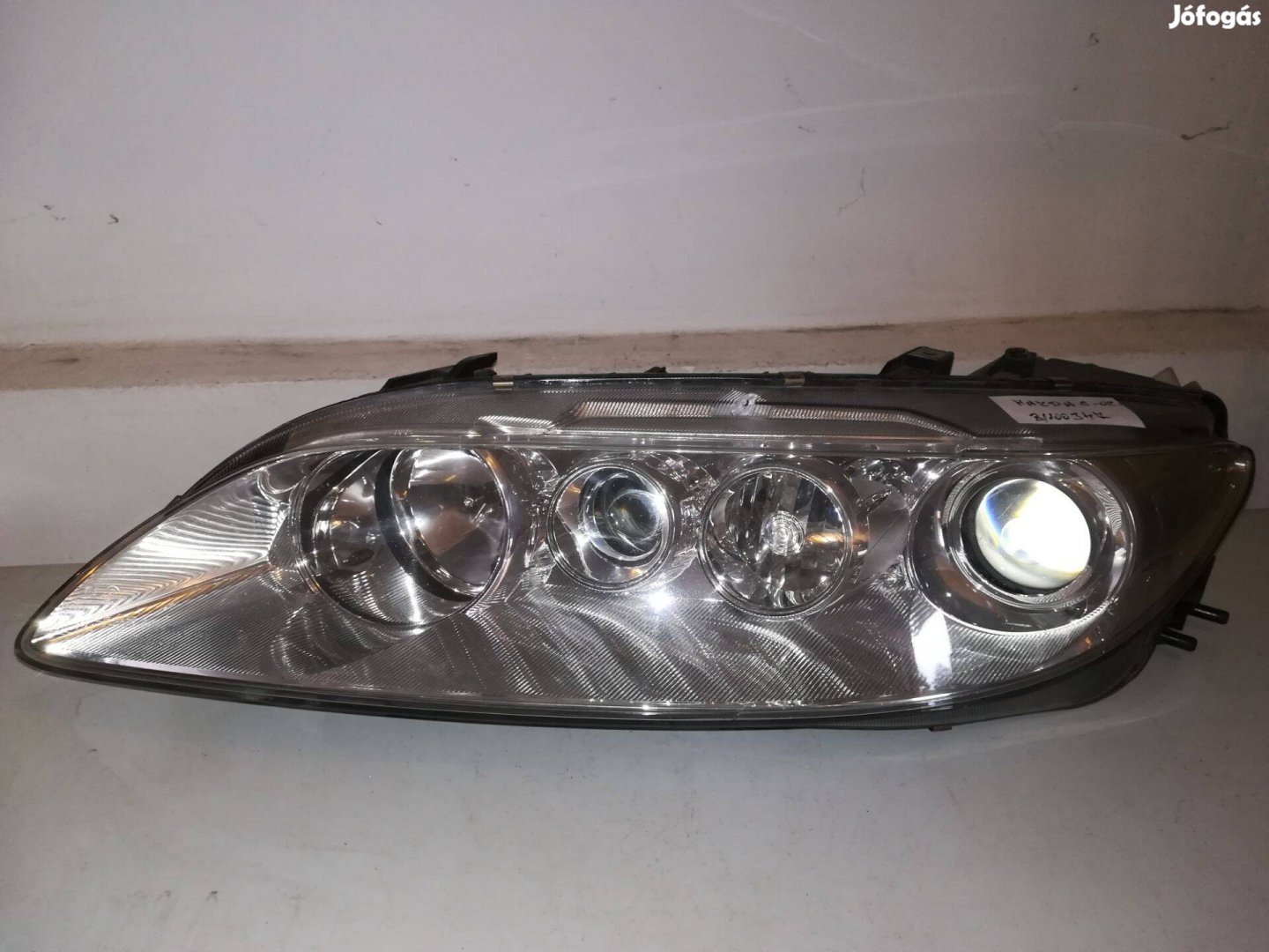 Mazda 6 fényszóró bal 2002.02 -> 2005 -> 2007 Xenon, javítva