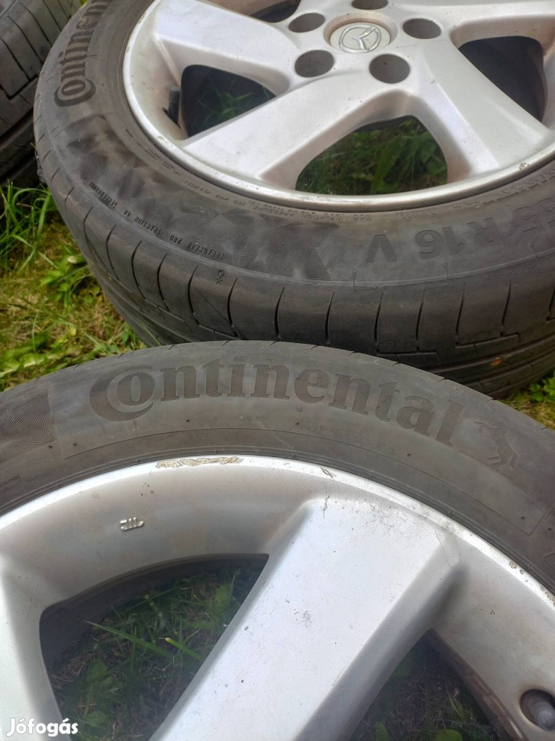 Mazda 6 gyári felni gumival.