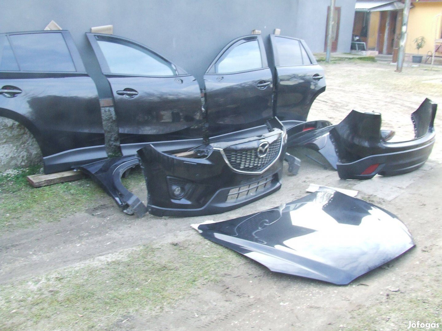 Mazda cx5 ajtó lőkháritó csomagtér ajtó sárvédő 2013 as