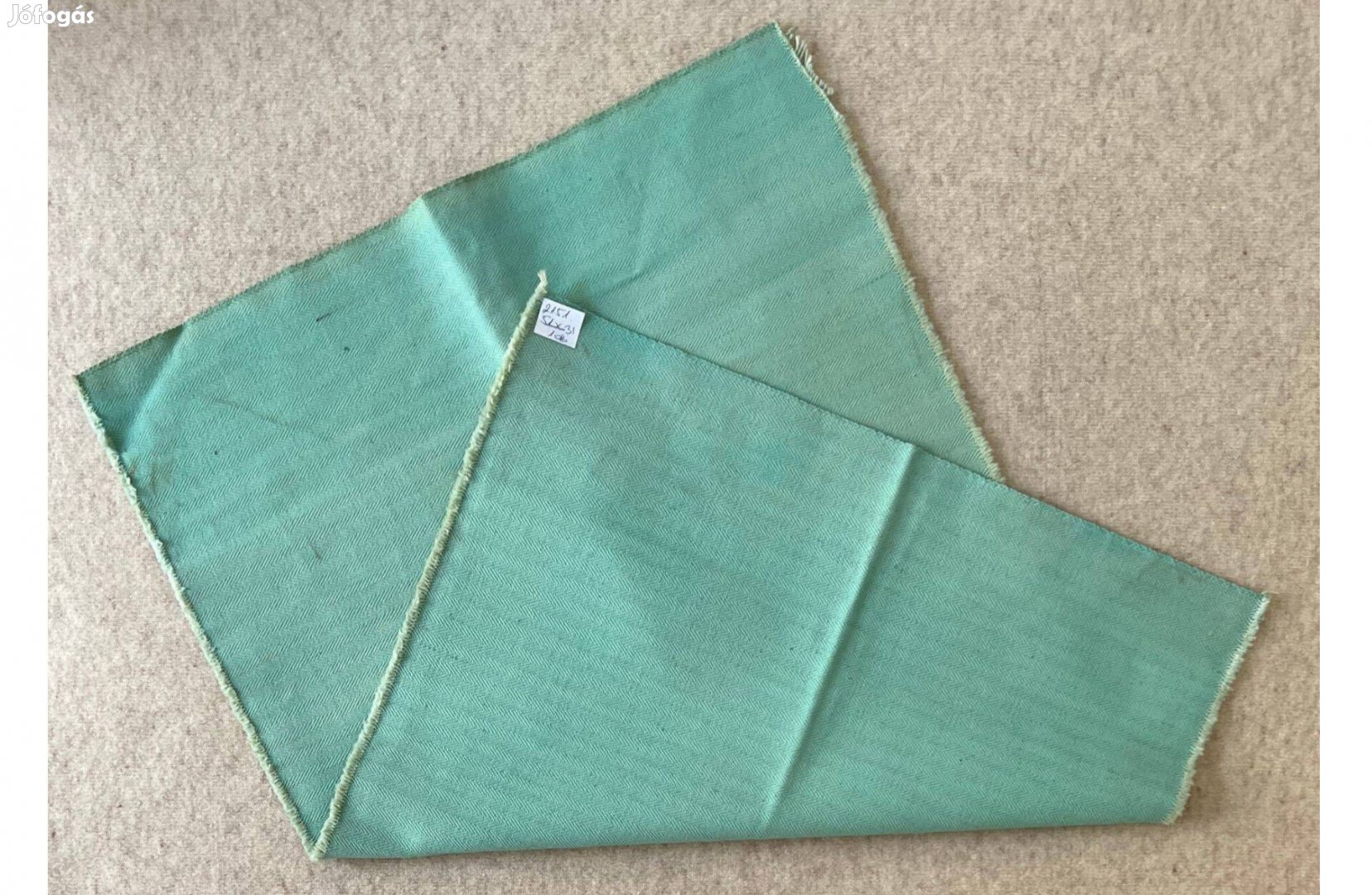 Méteráru, textil vászon, nagyon erős zöld