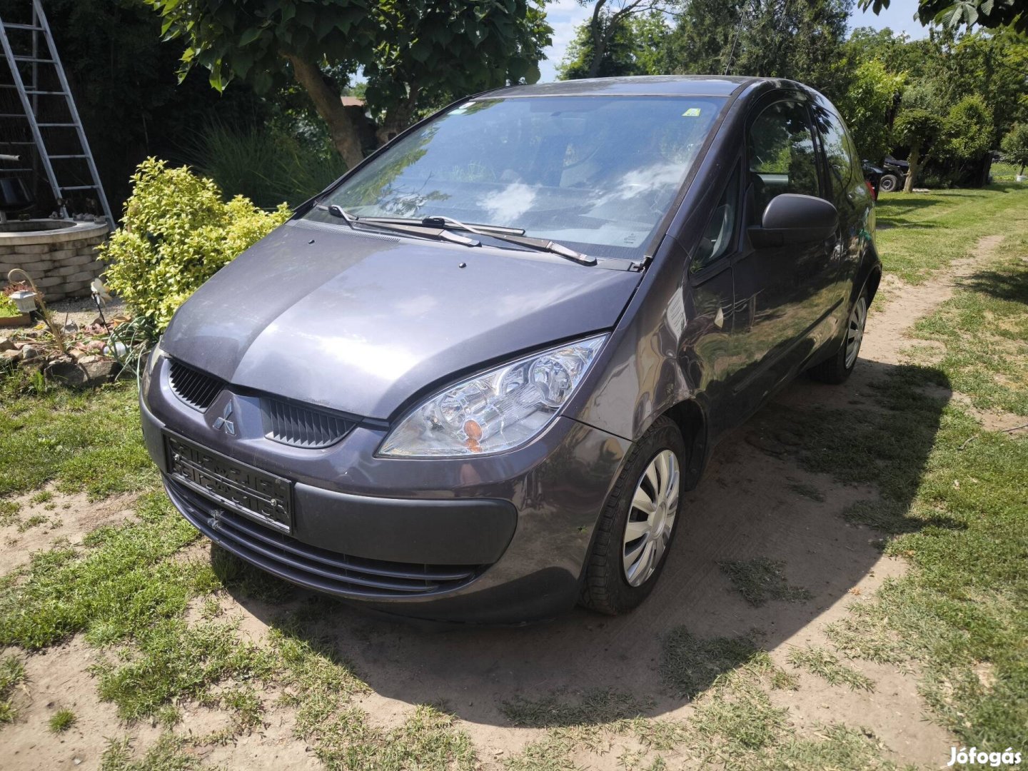 Mitsubishi Colt VI 04- lámpa  sárvédő motorhazteto homlokfal