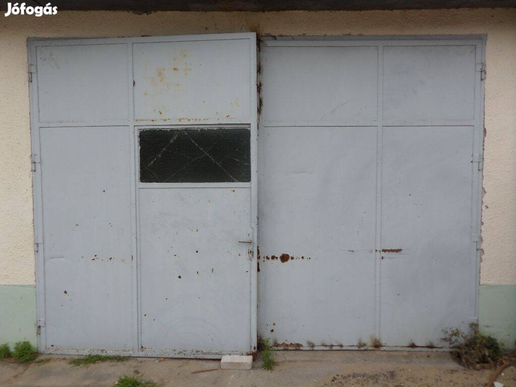 Nagyméretű fém - lemez garázsajtó - műhely ajtó eladó
