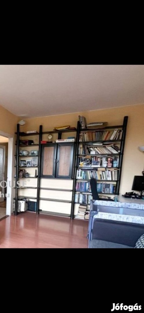 Nagyméretű könyvespolc falipolc szekrénnyel eladó