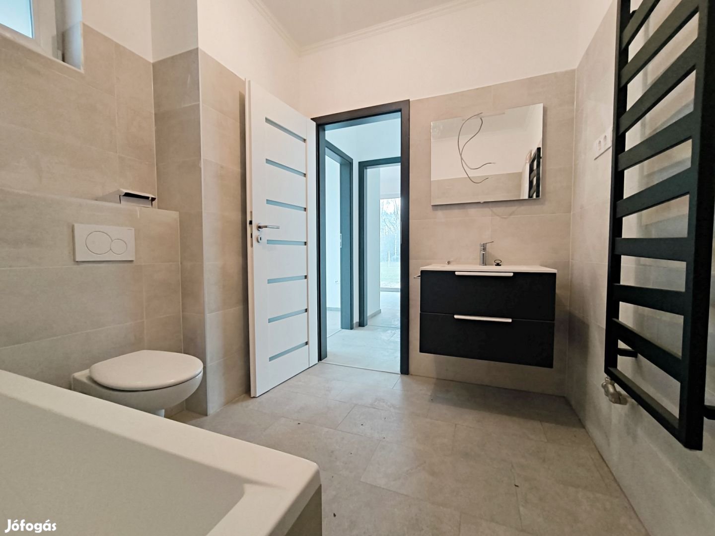 Nappali 3 hálós ikerház csendes környéken eladó