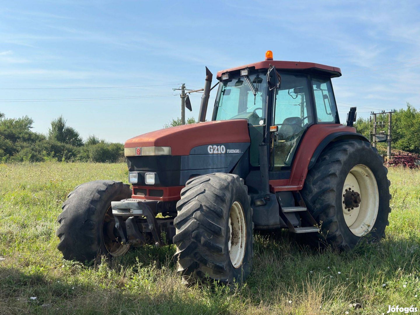 New Holland G210 traktor