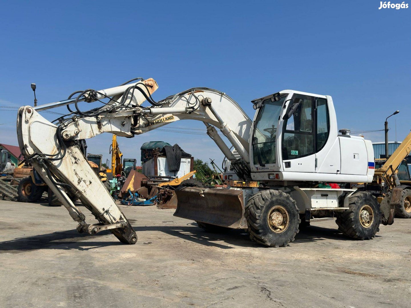 New Holland MH Plus gumikerekes kotró