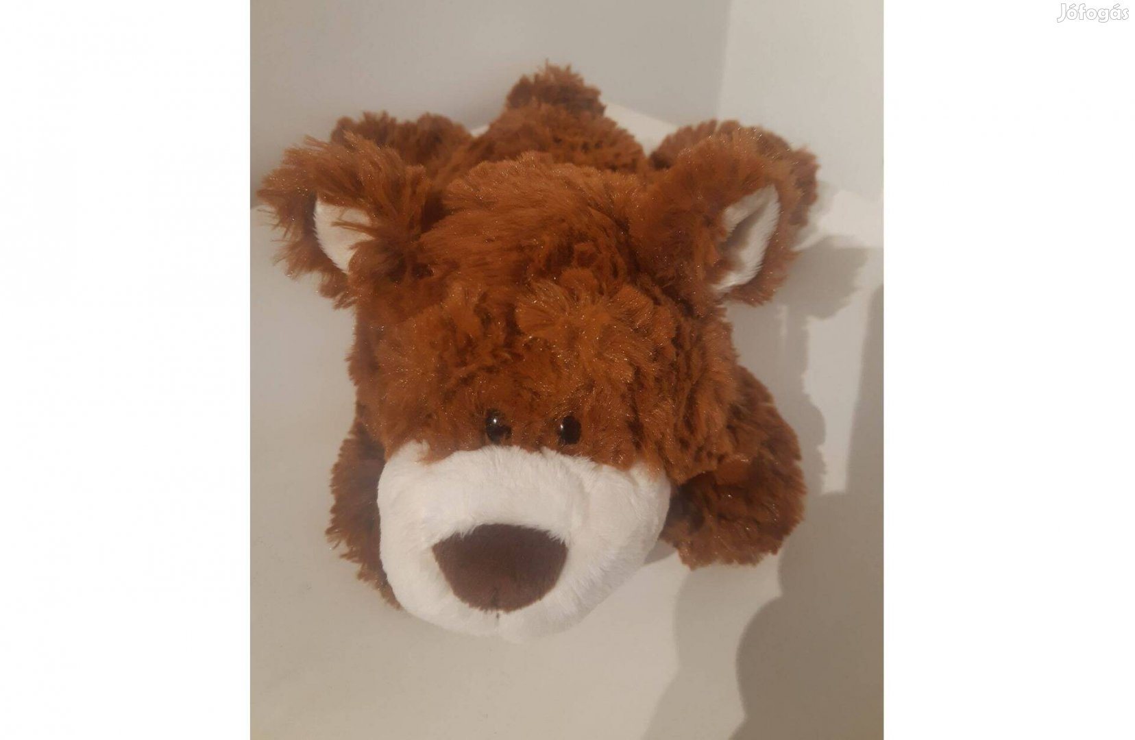 Nici barna fekvő 30 cm hosszú mackó