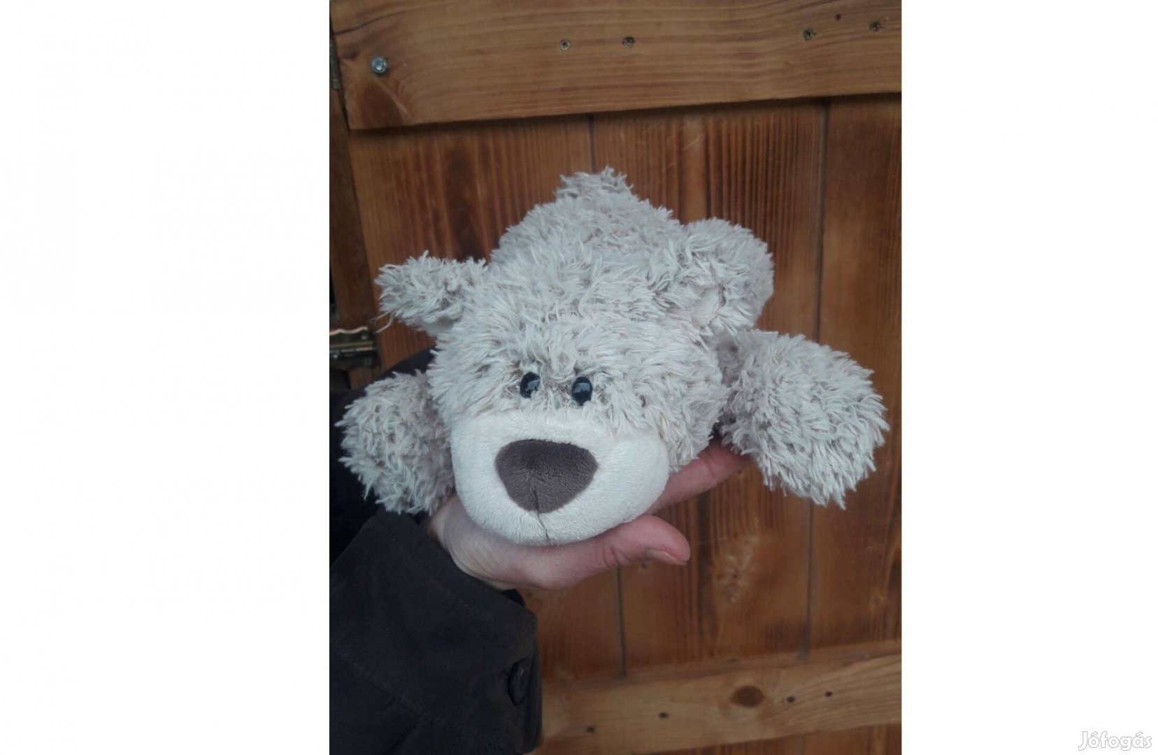 Nici szürke fekvő mackó