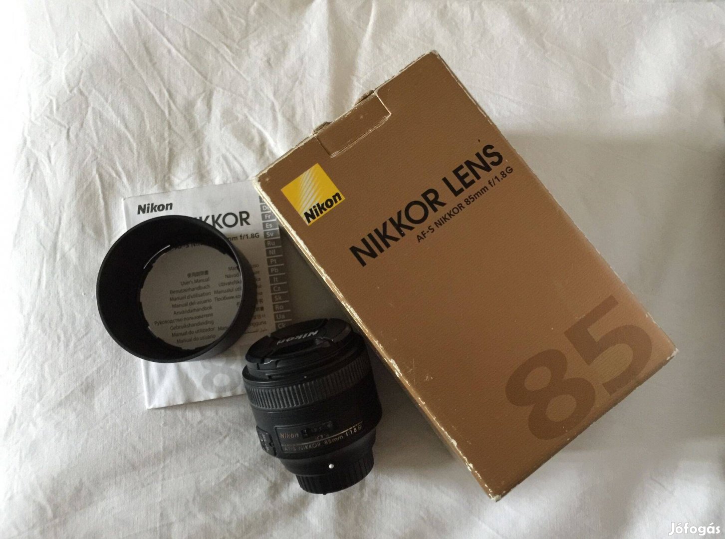 Nikon 1.8/85 AF-S portréobjektív dobozában, papírjaival eladó