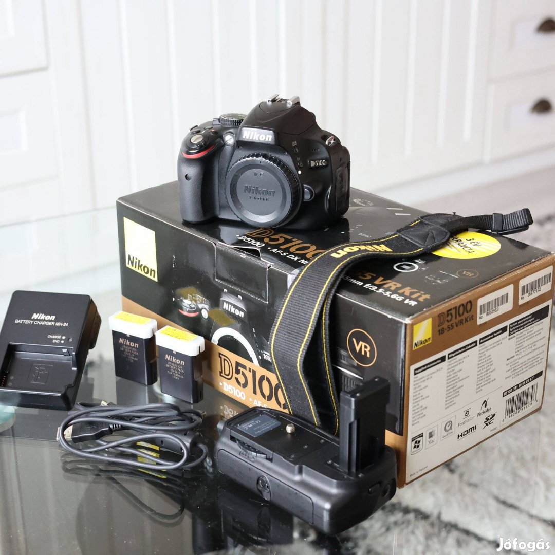 Nikon D5100 fényképezőgép + 2 akku+32GB SD+portrémarkolat