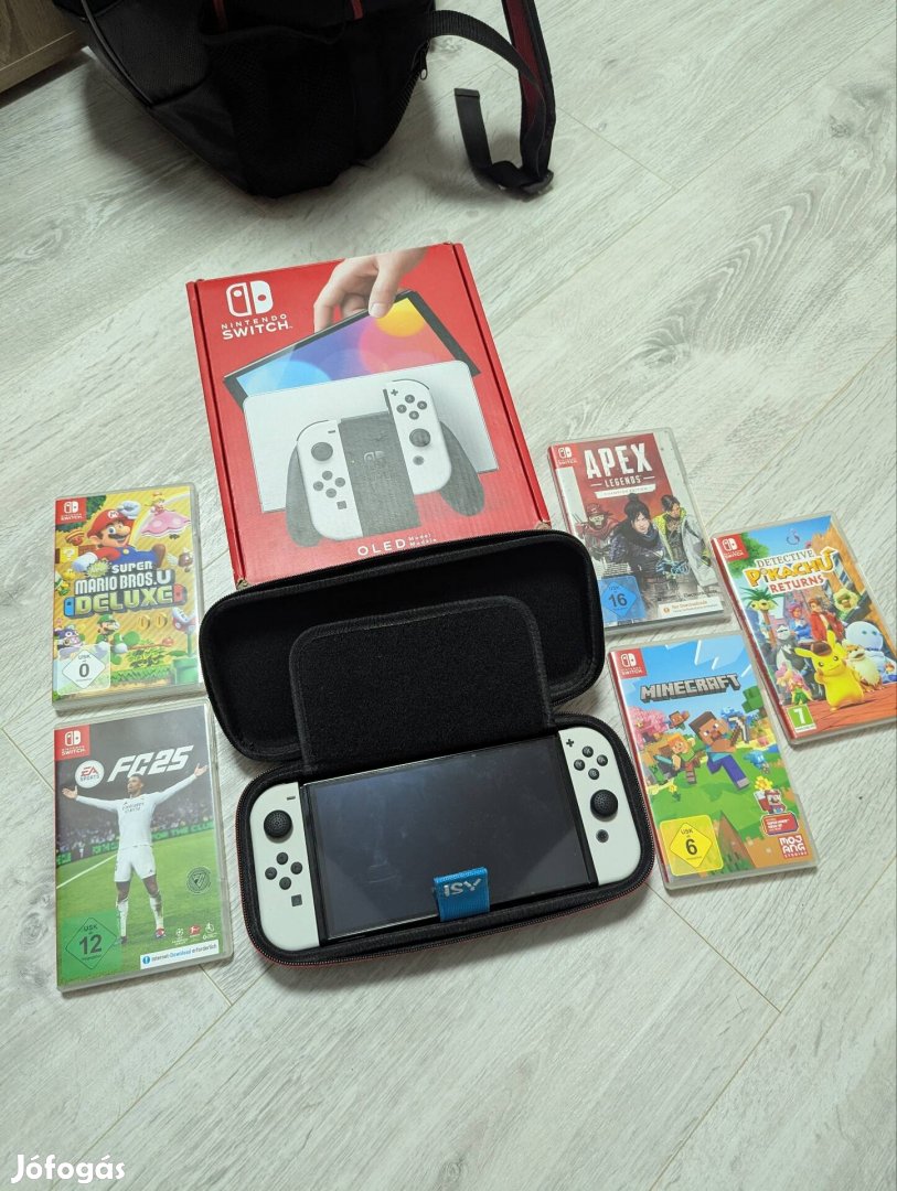 Nintendo Switch OLED + 5 játék + védőtok