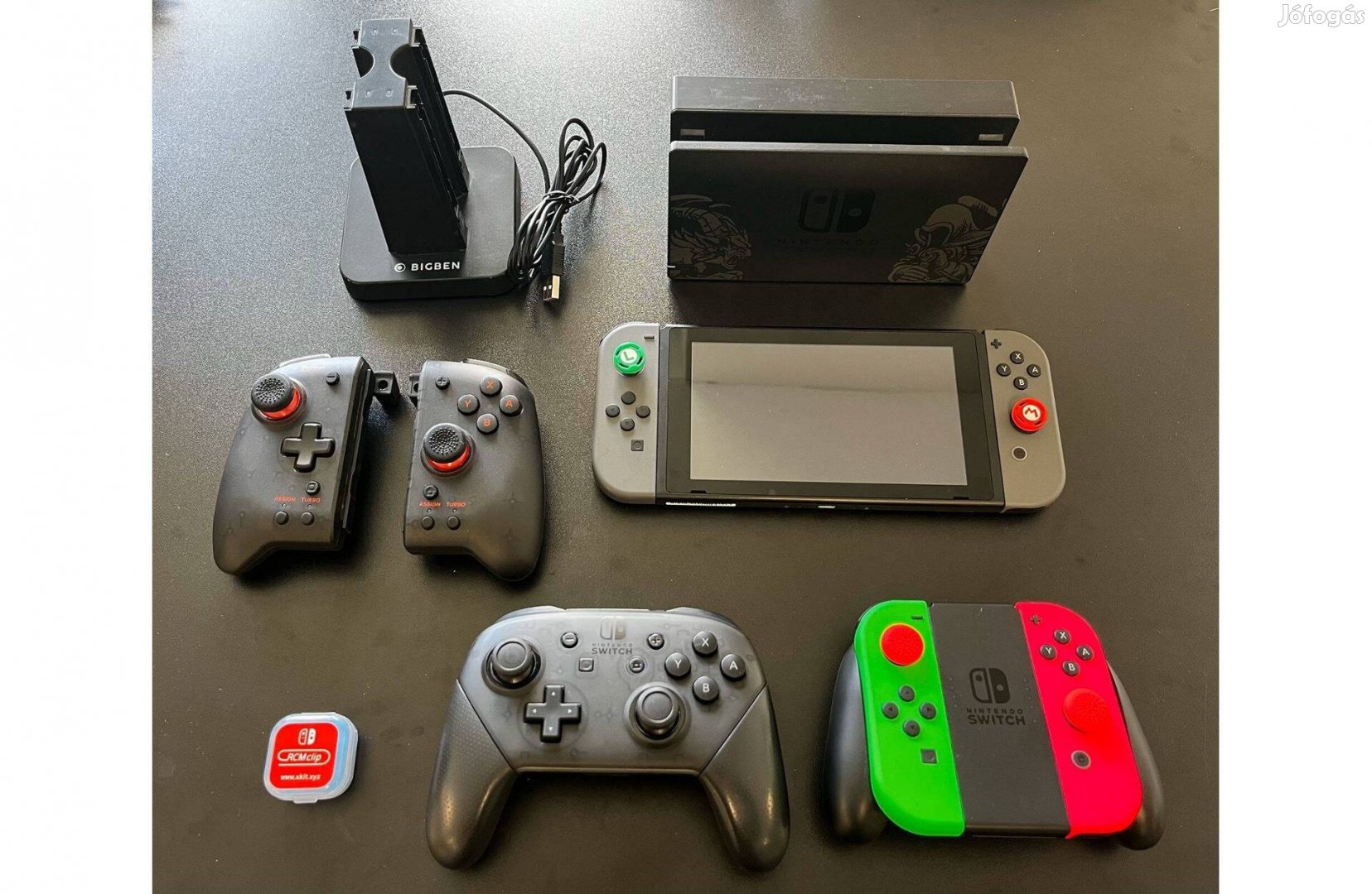 Nintendo Switch (első generációs) + kontroller karok + kiegészítők