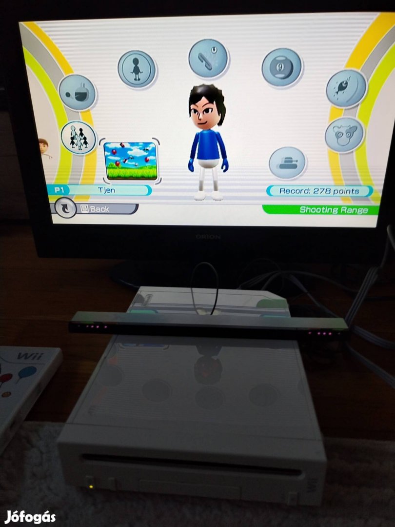 Nintendo wii 1db joytickal 1db gyári játékal kompletten. 