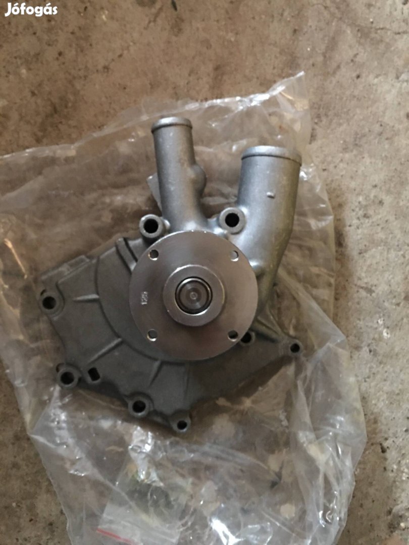 Nissan Vanette vizpumpa oem :210109C600