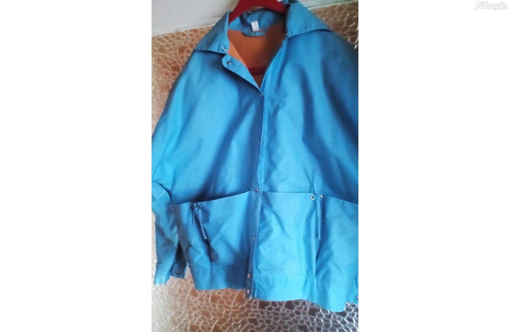 Női kék színű kabát legombolható ujjal