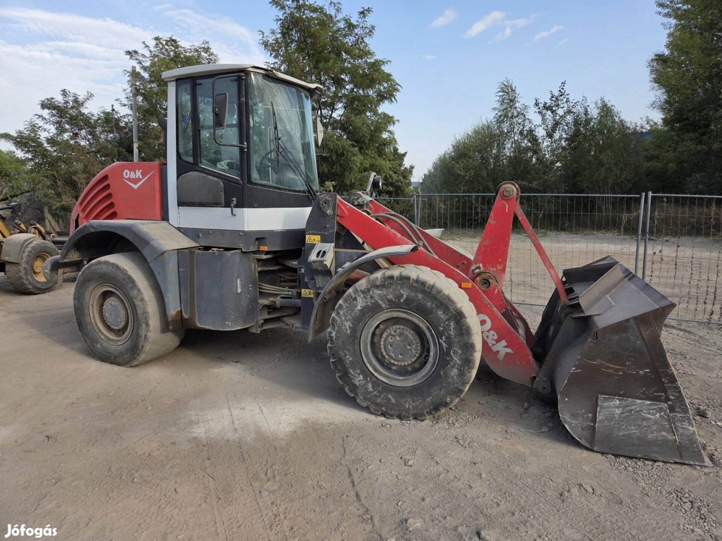 O&K L 25.5 homlokrakodó kanálmérleggel