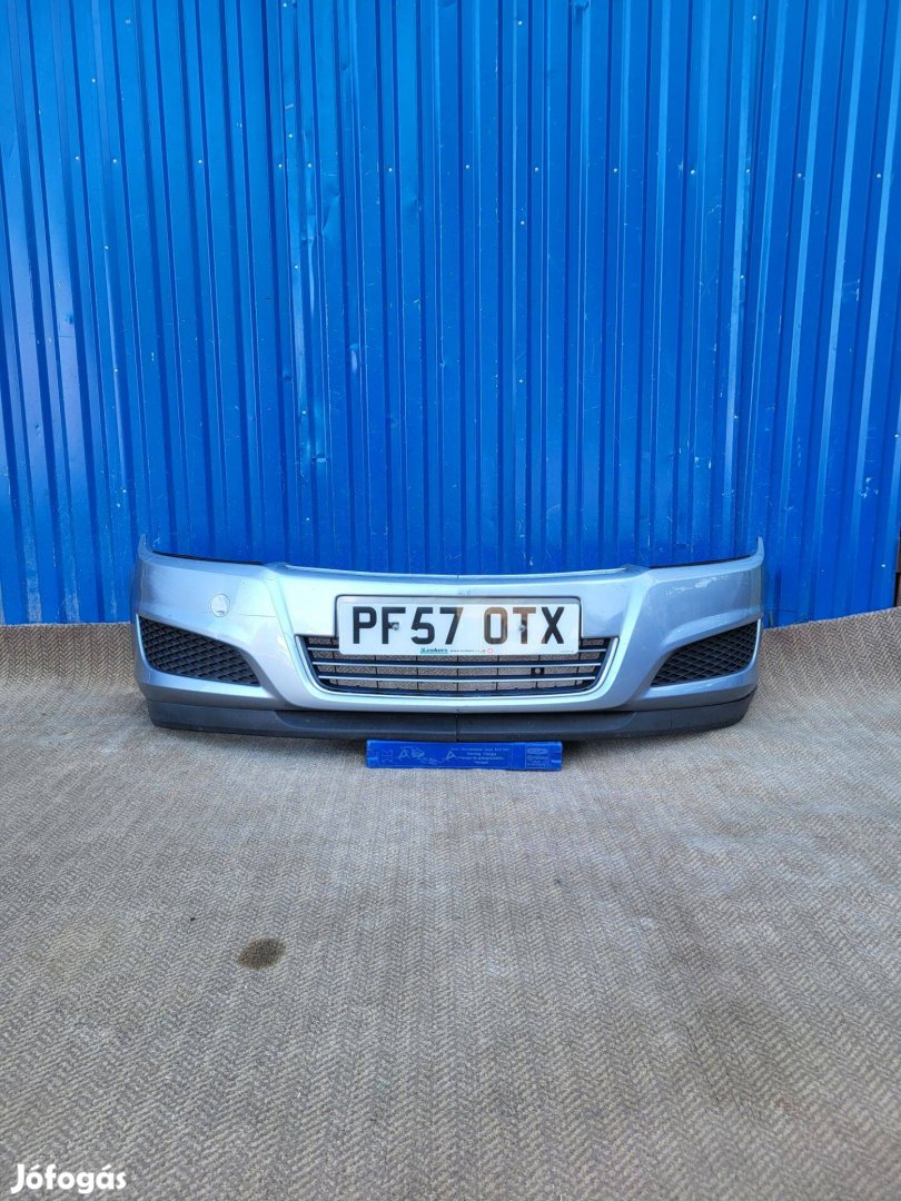 Opel Astra H gyári 13225746 első lökhárító szürke