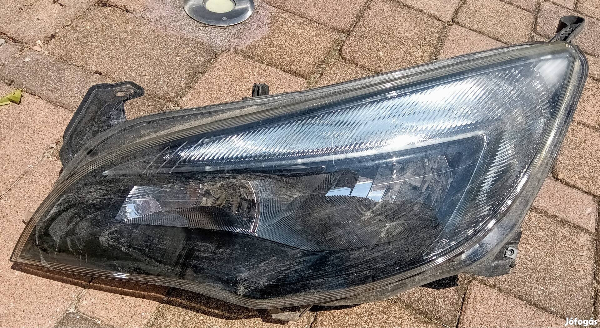 Opel Astra J bal első (13371595) fényszóró