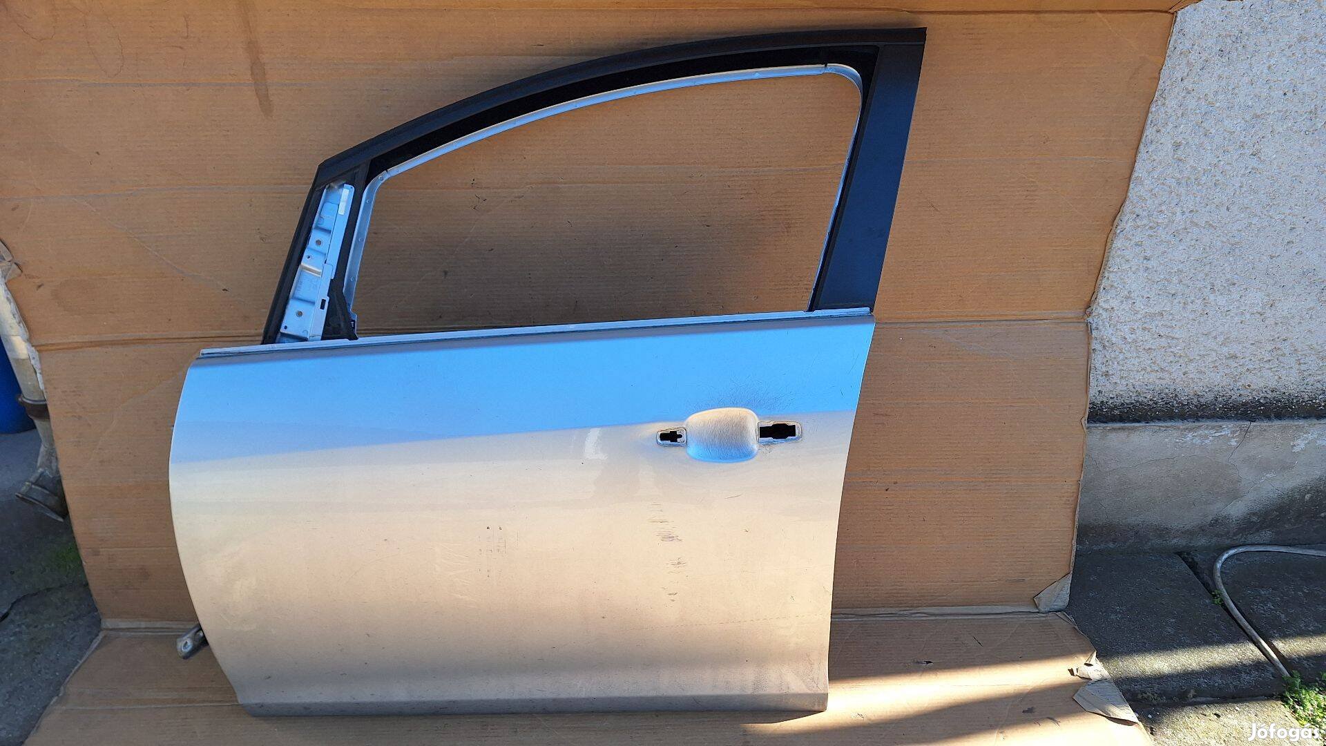 Opel Astra J kombi bal első ajtó ezüst Z176