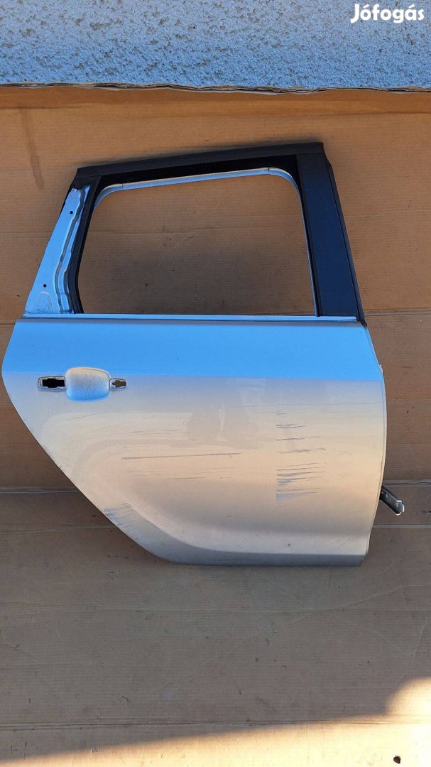 Opel Astra J kombi jobb hátsó ajtó ezüst Z176