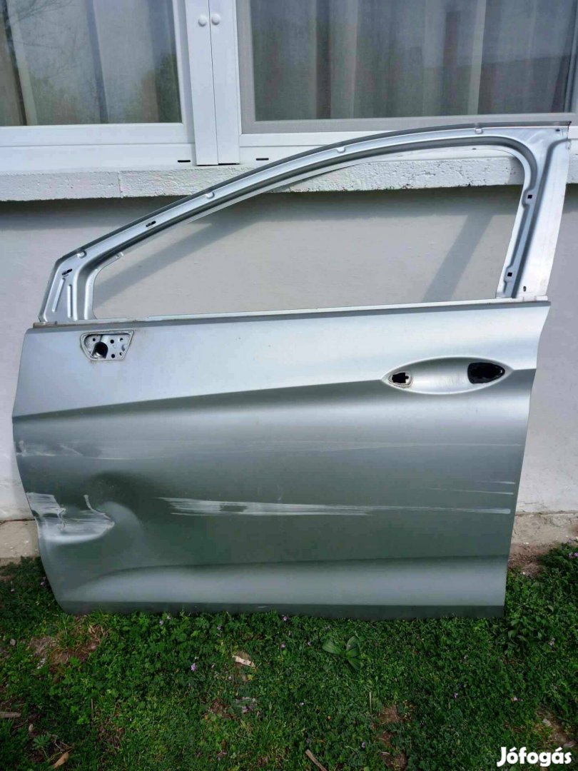 Opel Astra K bal első ajtó sérülten