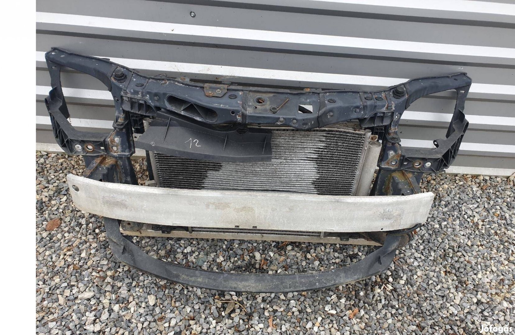 Opel Corsa D diesel homlokfal zárhíd