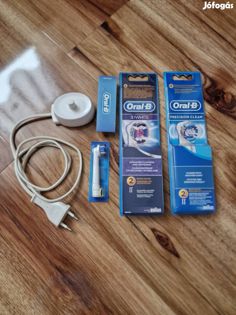 Oral-b fogkefe töltő és 6 db gyári bontatlan pótfej eladó 