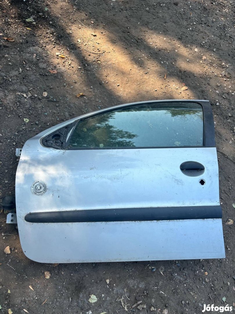 Peugeot 206 bal első ajtó ezüstös