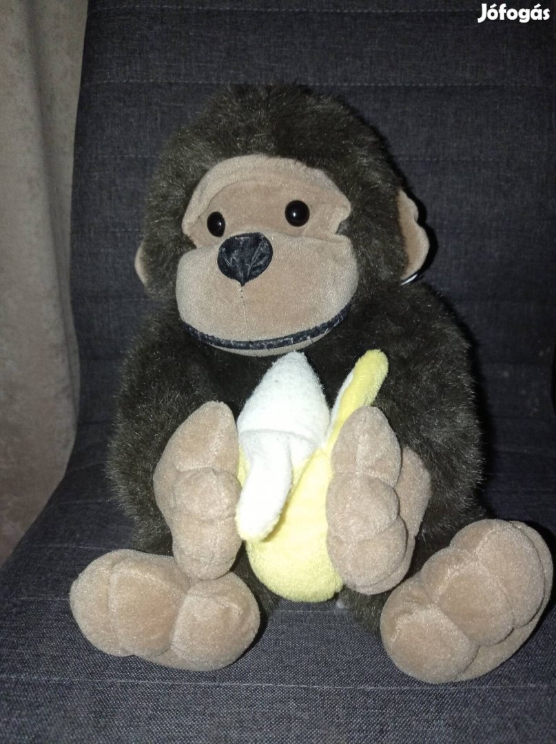Plüss majom banánnal 