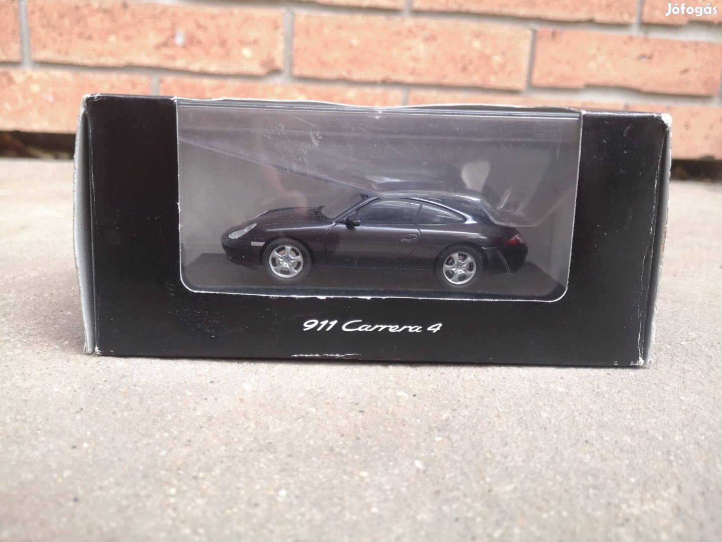 Porsche 911 Carrera 4 (1:43) Schuco modellautó