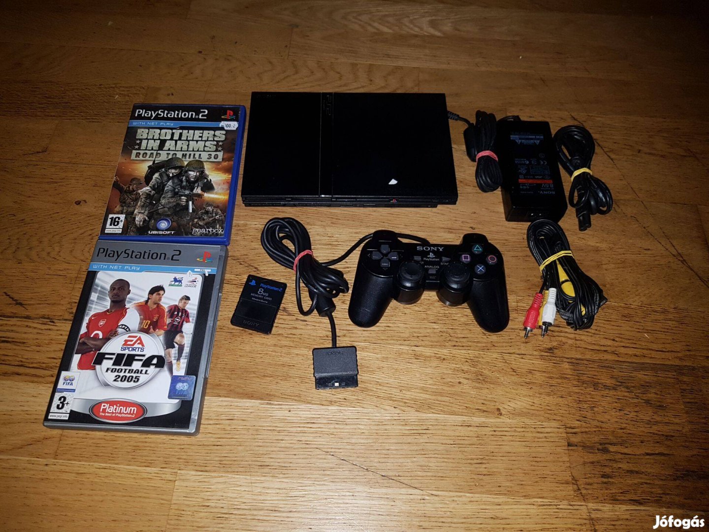 Ps2 slim 2 darab játékkal eladó