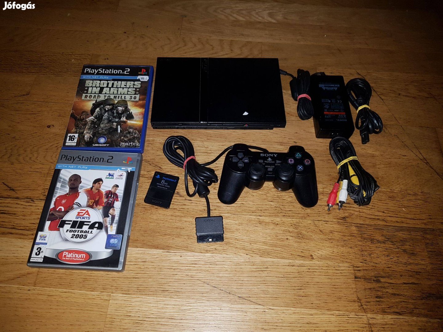 Ps2 slim 2-db játékkal eladó
