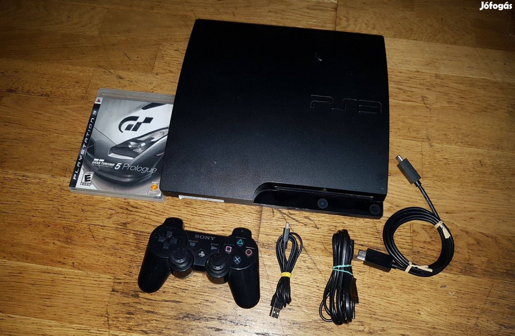 Ps3 slim 320-gb hen pár játékkal eladó