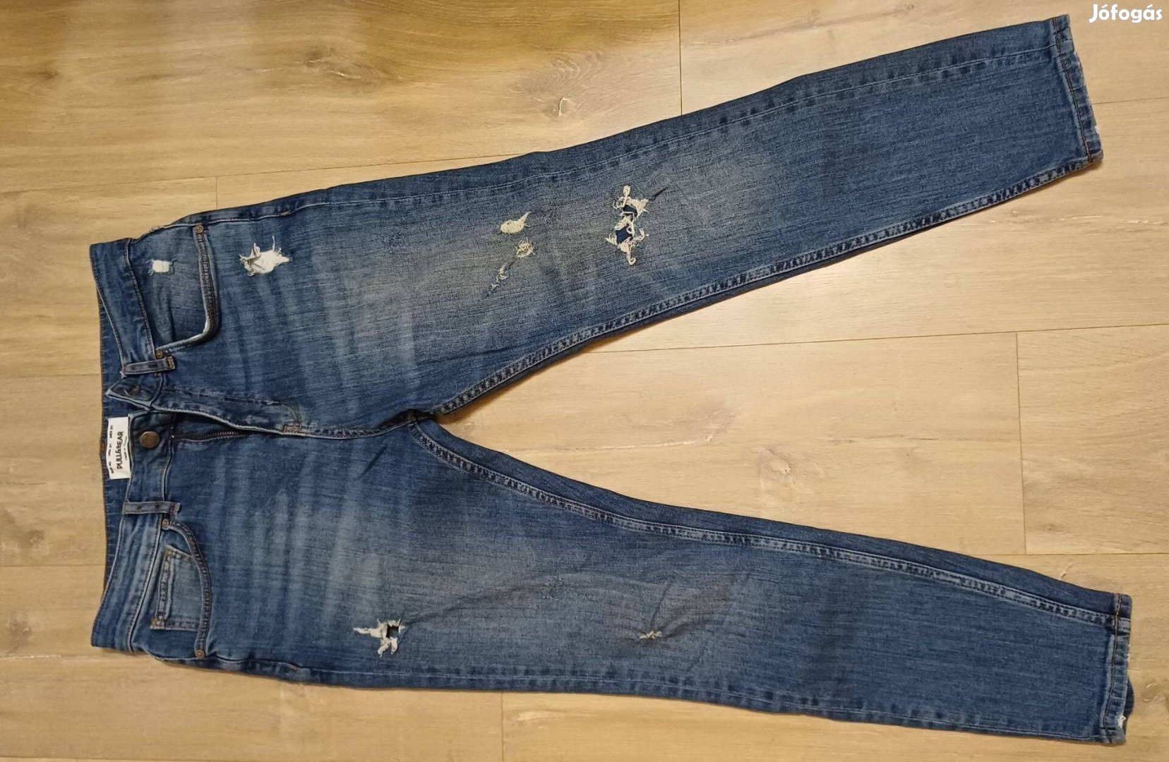 PullBear kék, szaggatott férfi farmernadrág 40