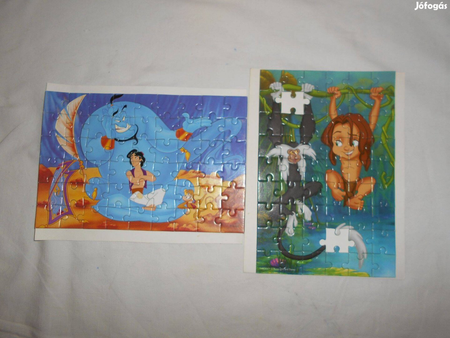 Puzzle, papír, egy Aladdin és egy Maugli, 19,5x13 cm-esek