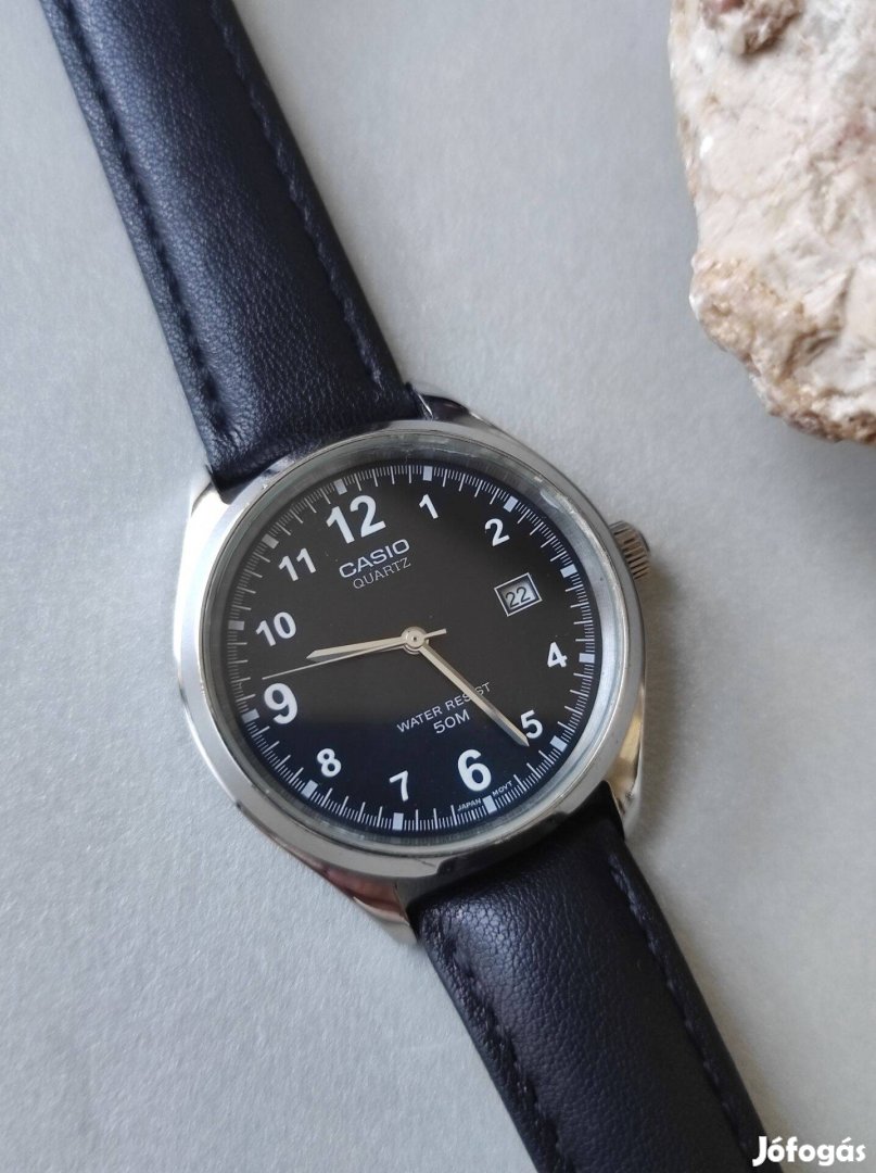 Quartz Casio 50m szép karóra