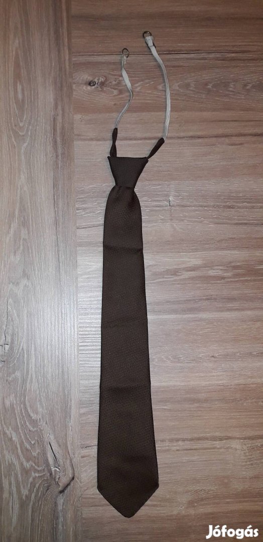 Régi tezytal nyakkendő. Barna színű. Mérete: 44 cm. 