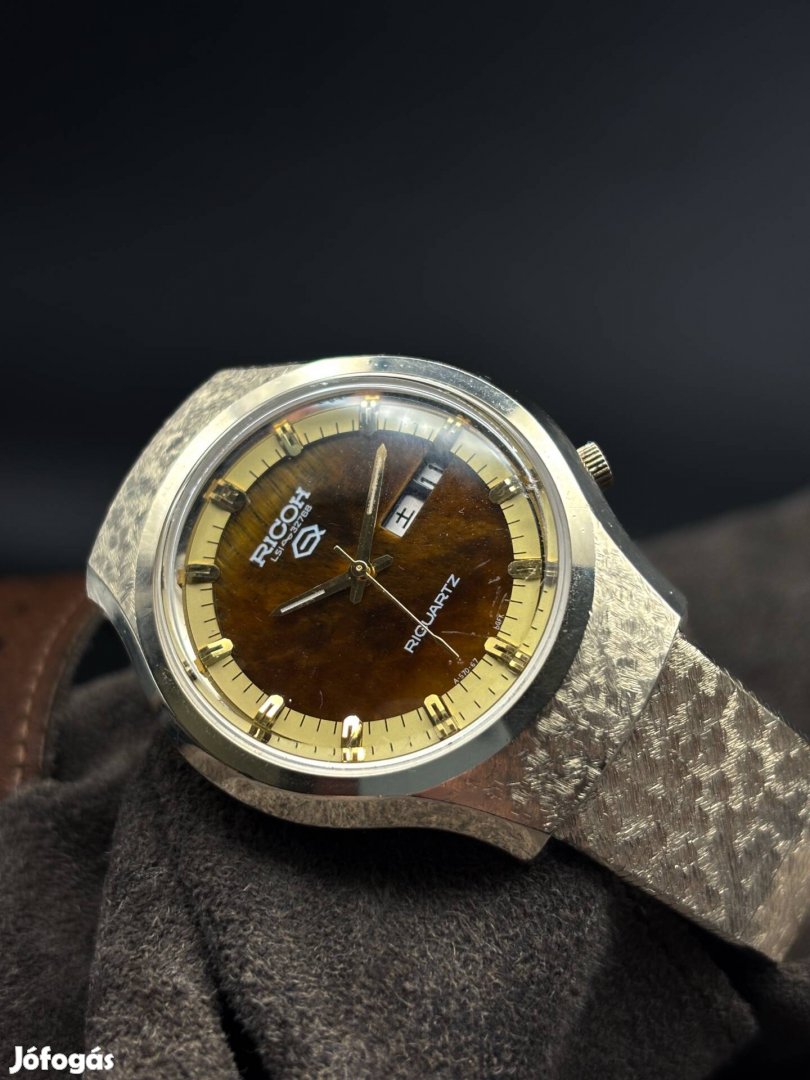 Ricoh Riquartz Tiger eye dial karóra