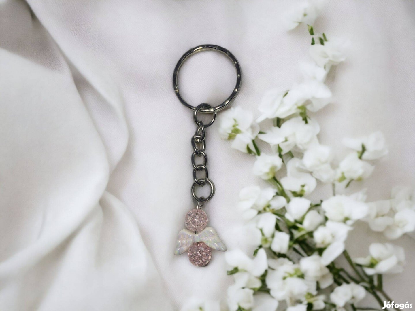 Roppantott rózsakvarc angyal kulcstartó