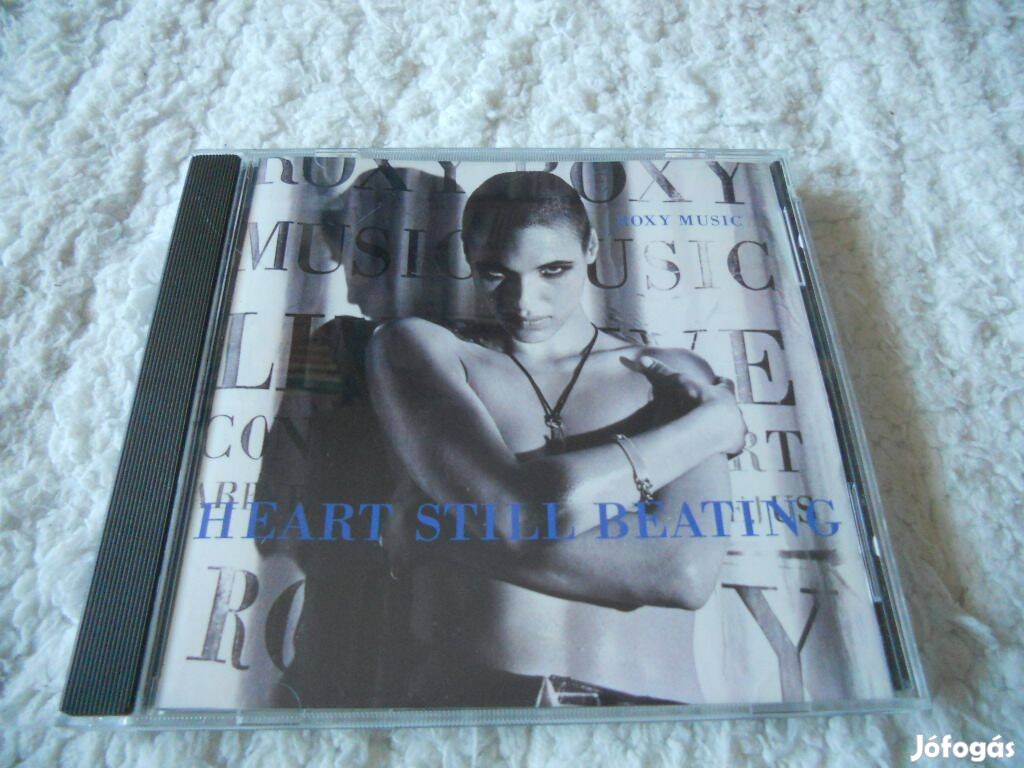 Roxy Music : Heart still beating CD ( USA)