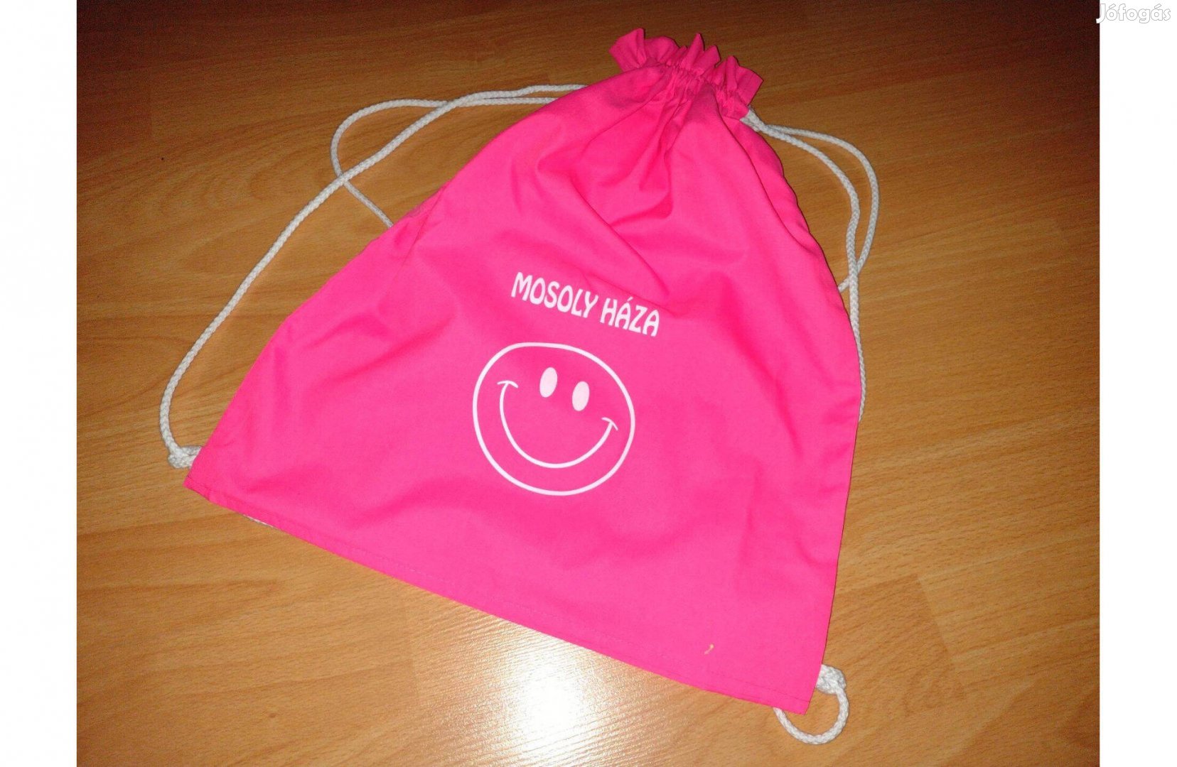 Rózsaszín kis mosolygós táska